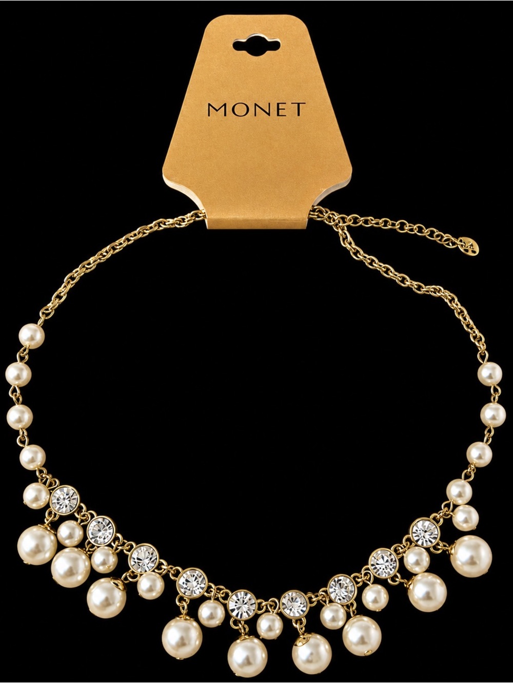 NWT Monet gold CZ and pearl like necklace with extender. Can wear on each side.